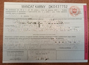 Zdjęcie przedstawiające mandat karny nało9żony na osobę która przekroczyła prędkość